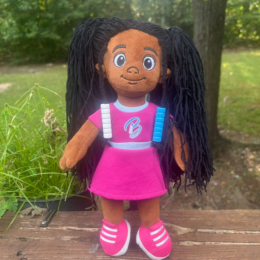 Bead Barrette doll wearing one white and one blue bead barrette
