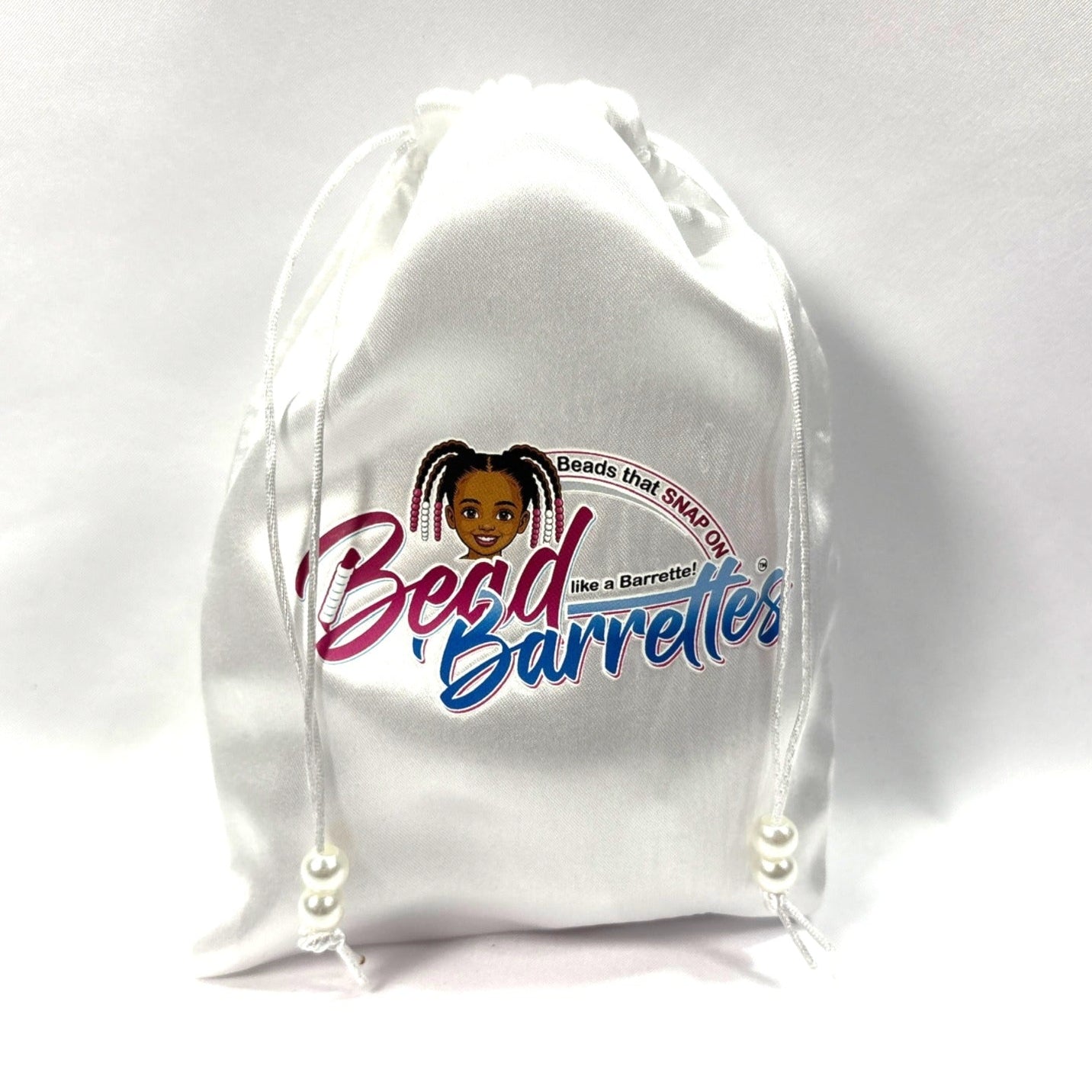 White Bead Barrettes satin storage bag with full Bead Barrettes logo