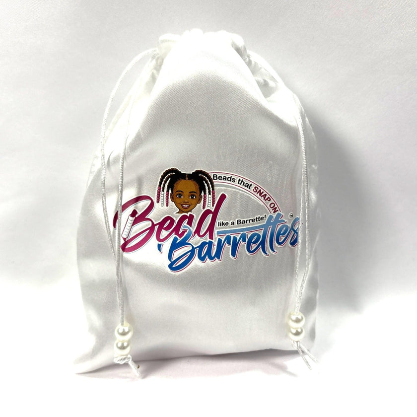 White Bead Barrettes satin storage bag with full Bead Barrettes logo
