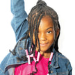 child with long braided hair wearing pink Bead Barrettes
